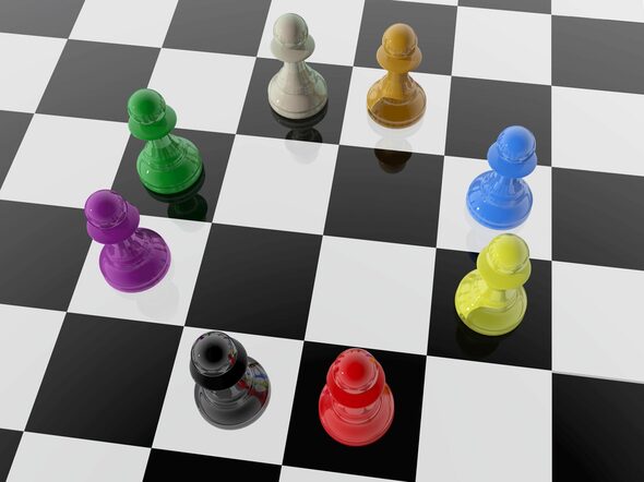 Chess pawns of different colors